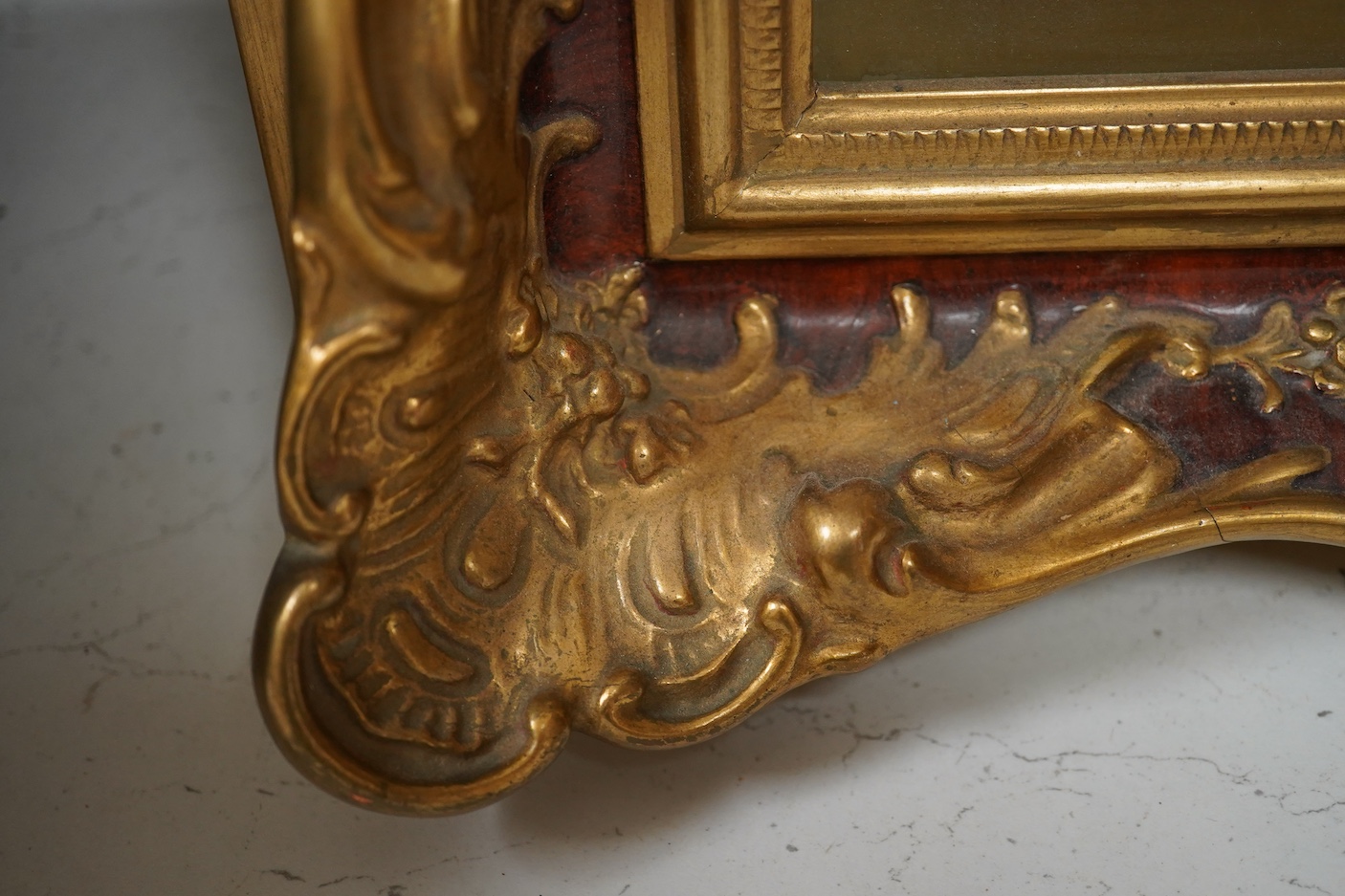 A Rosenthal porcelain plaque, 'The Hermit', housed in an ornate gilt frame, 45cm high overall